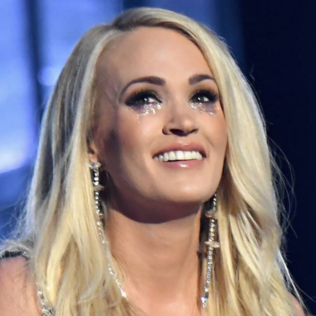 Carrie Underwood looks like a fairytale princess in strapless gown embellished in glitter