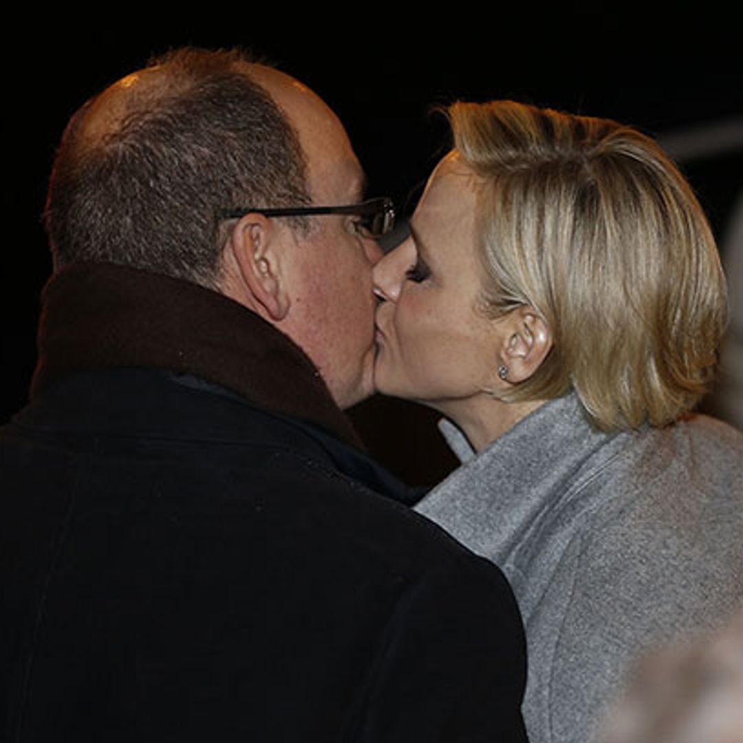Prince Albert and Princess Charlene of Monaco share a kiss at first public engagement since birth of twins