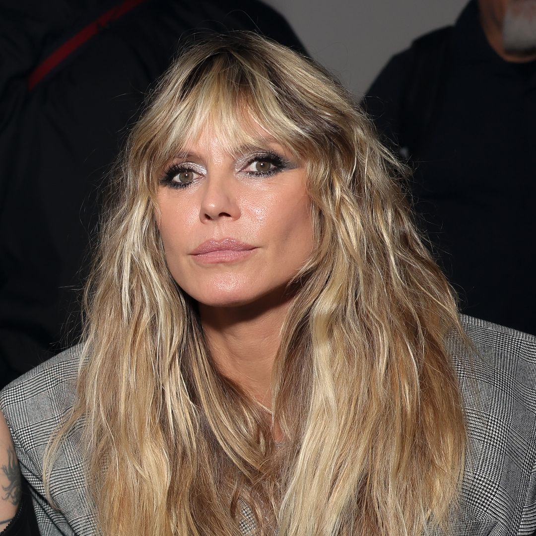 Heidi Klum turns heads in naked dress as she debuts teeth transformation 