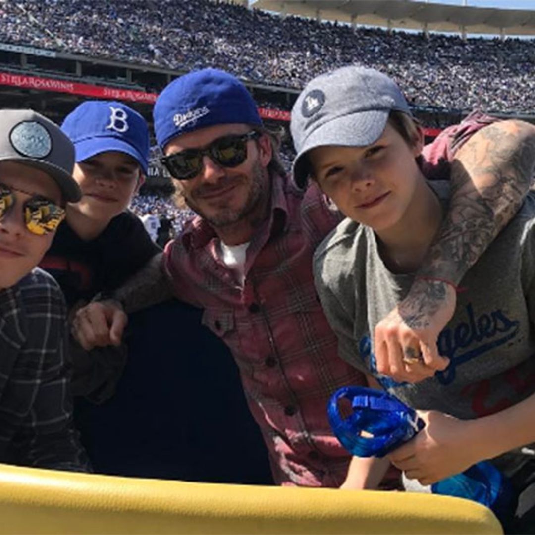 David Beckham bonds with three sons at baseball game