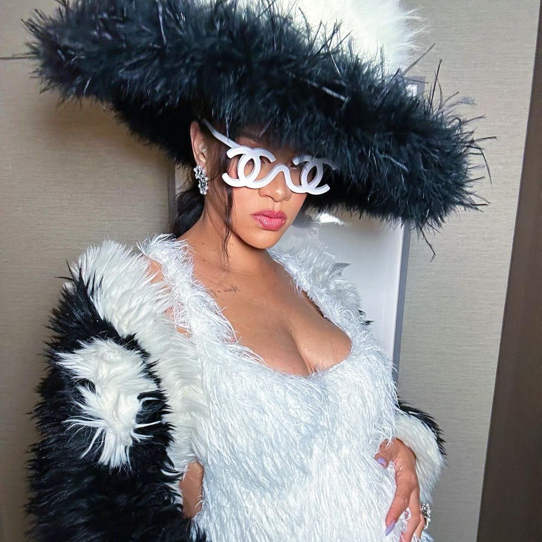 Pregnant Rihanna highlights growing baby bump in furry mini dress as she teases Met Gala look