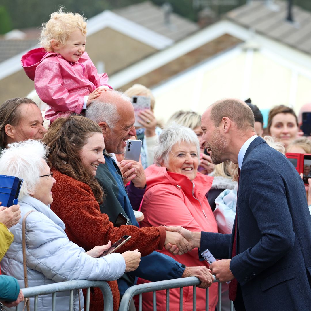 Prince William admits there's still 'long way to go' in Kate's cancer recovery as he steps out for first solo visit to Wales