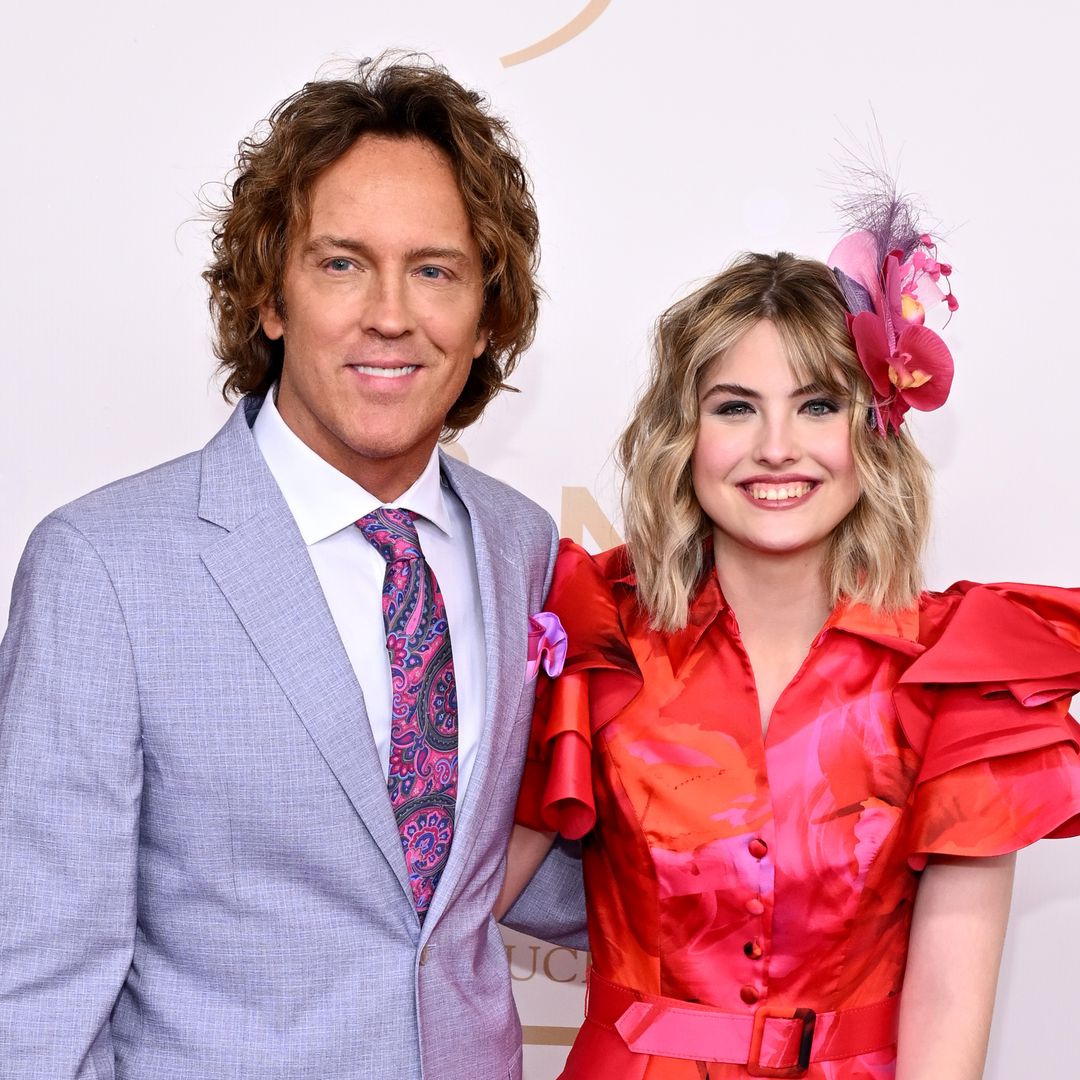 Anna Nicole Smith's teen daughter Dannielynn supports dad Larry Birkhead during trip back home
