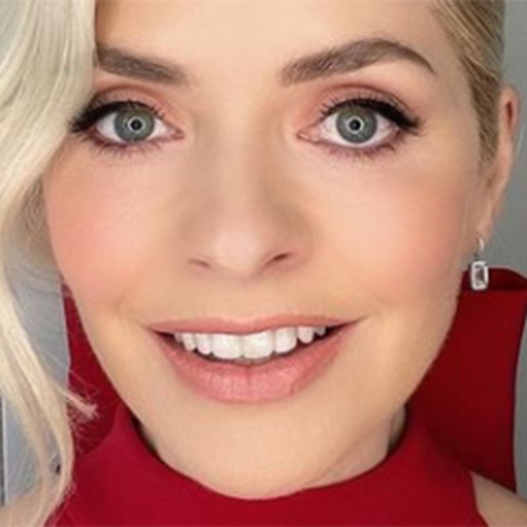 Holly Willoughby wears off-duty red dress for book project