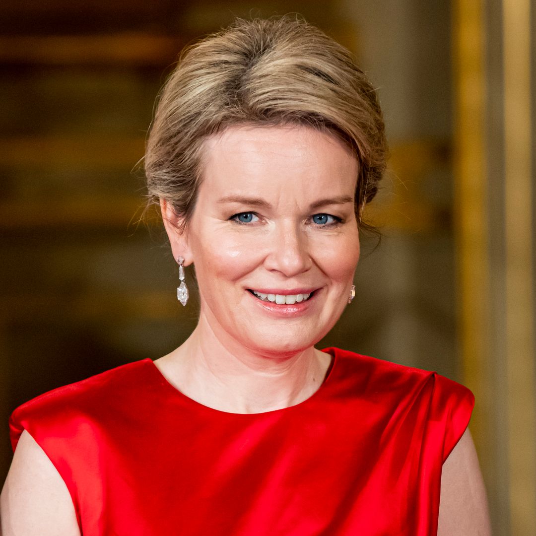 Queen Mathilde is the ultimate mob wife in unexpected leopard print and hoop earrings