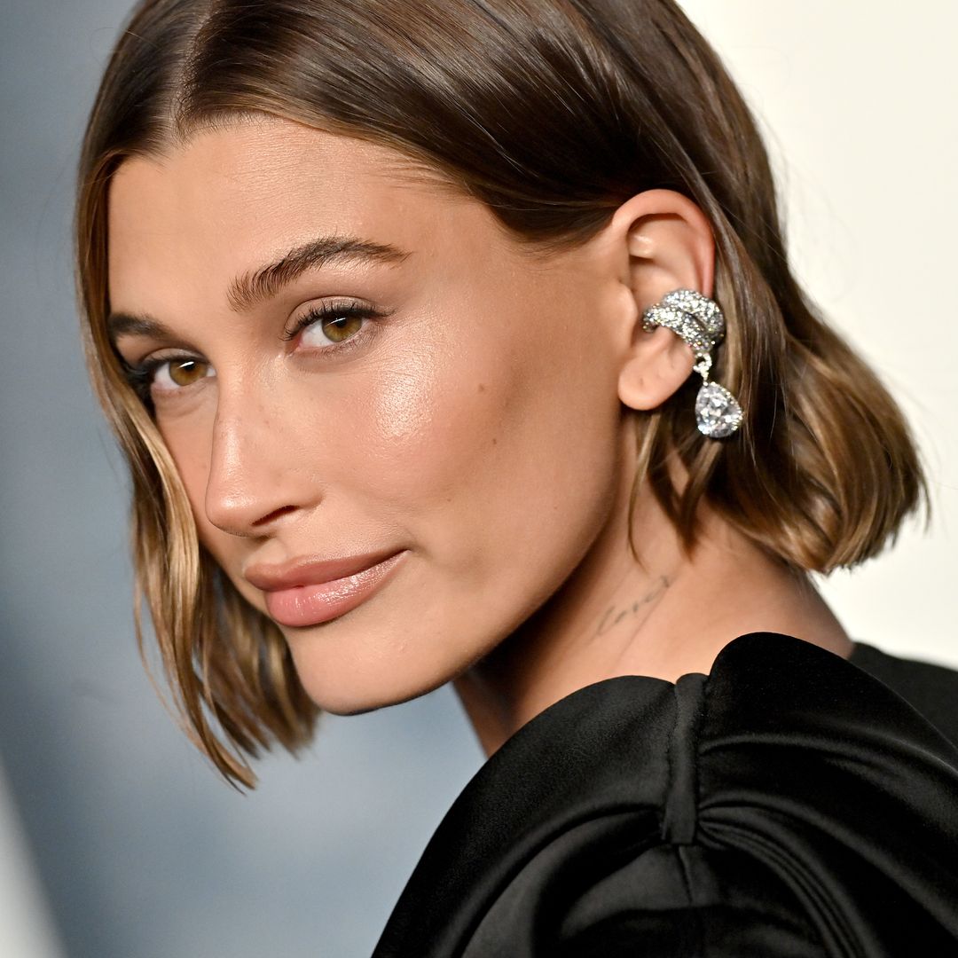Hailey Bieber just wore a mini dress made from metal watch straps