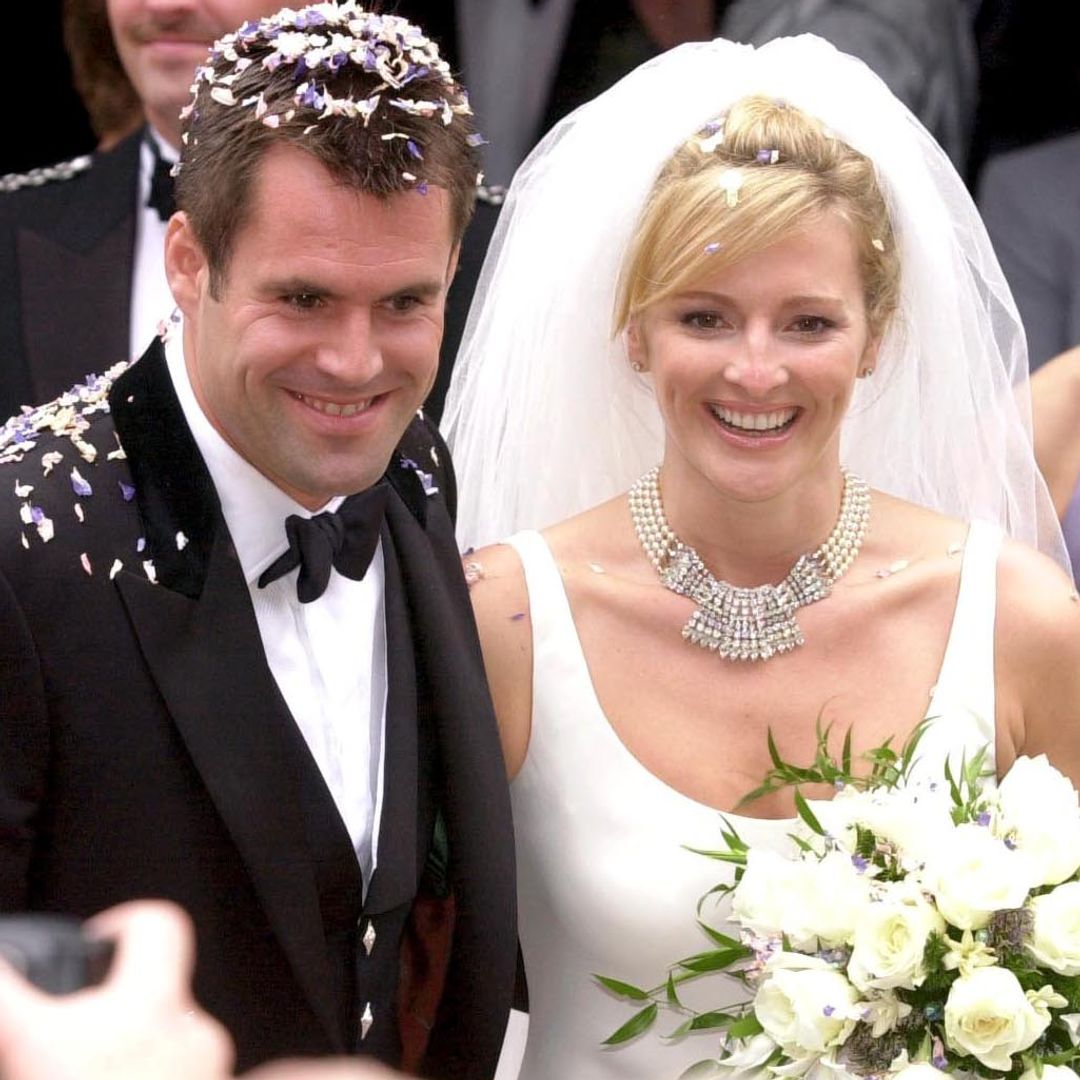 Gabby Logan was all smiles in cascading bridal dress and pearl choker on wedding day