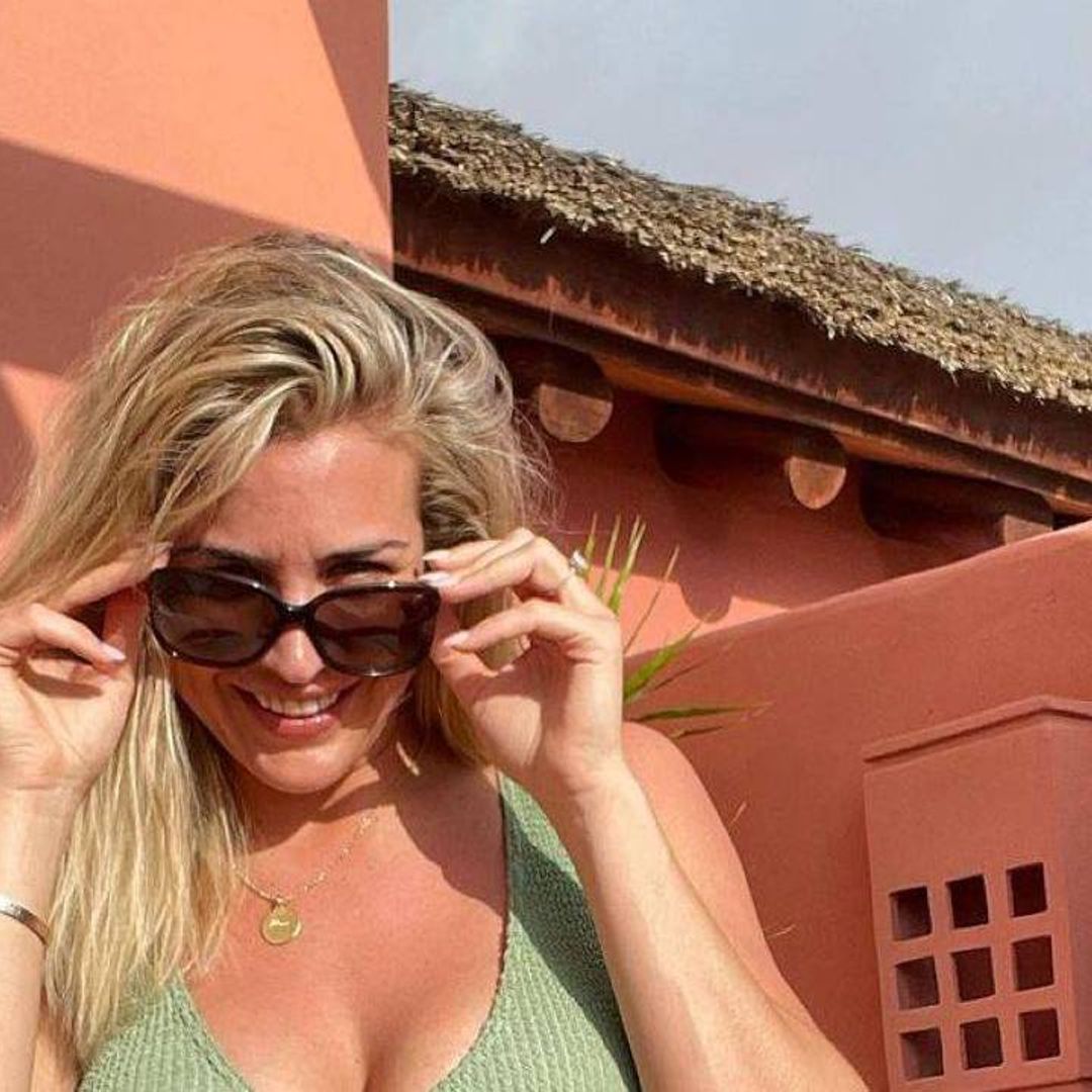 Gemma Atkinson wows in strapless sunbathing outfit in new video