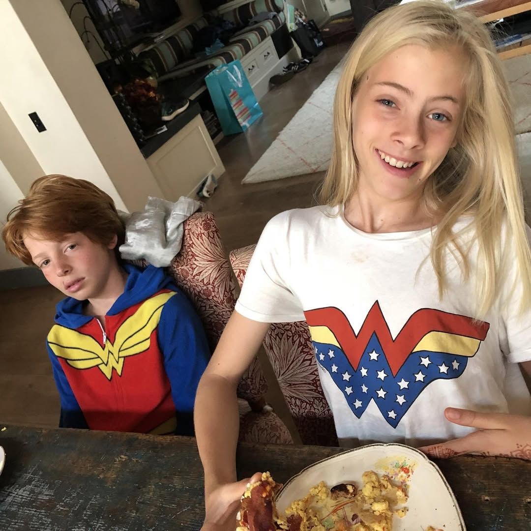 Julia Roberts and Danny Moder's twins Phinnaeus and Hazel pose for a photo at home while eating breakfast, shared on Instagram