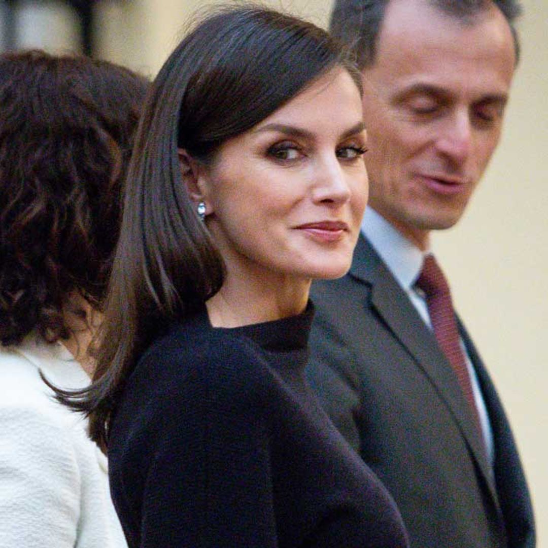 Queen Letizia just wore a Cos jumper dress with a pair of thigh-high boots and wow, the perfect fashion combo