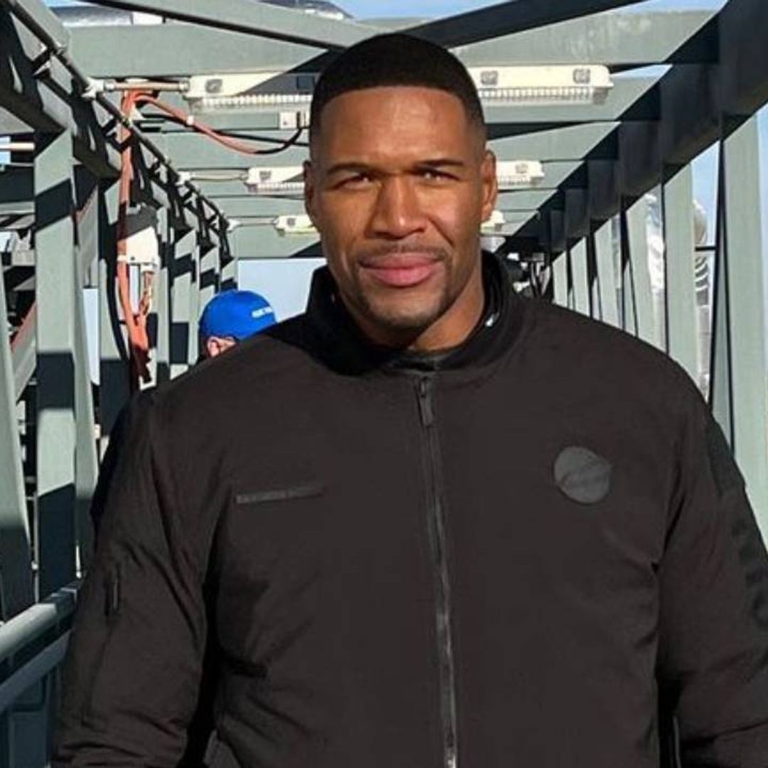 Michael Strahan towers over companion in photo branding him 'best big brother'