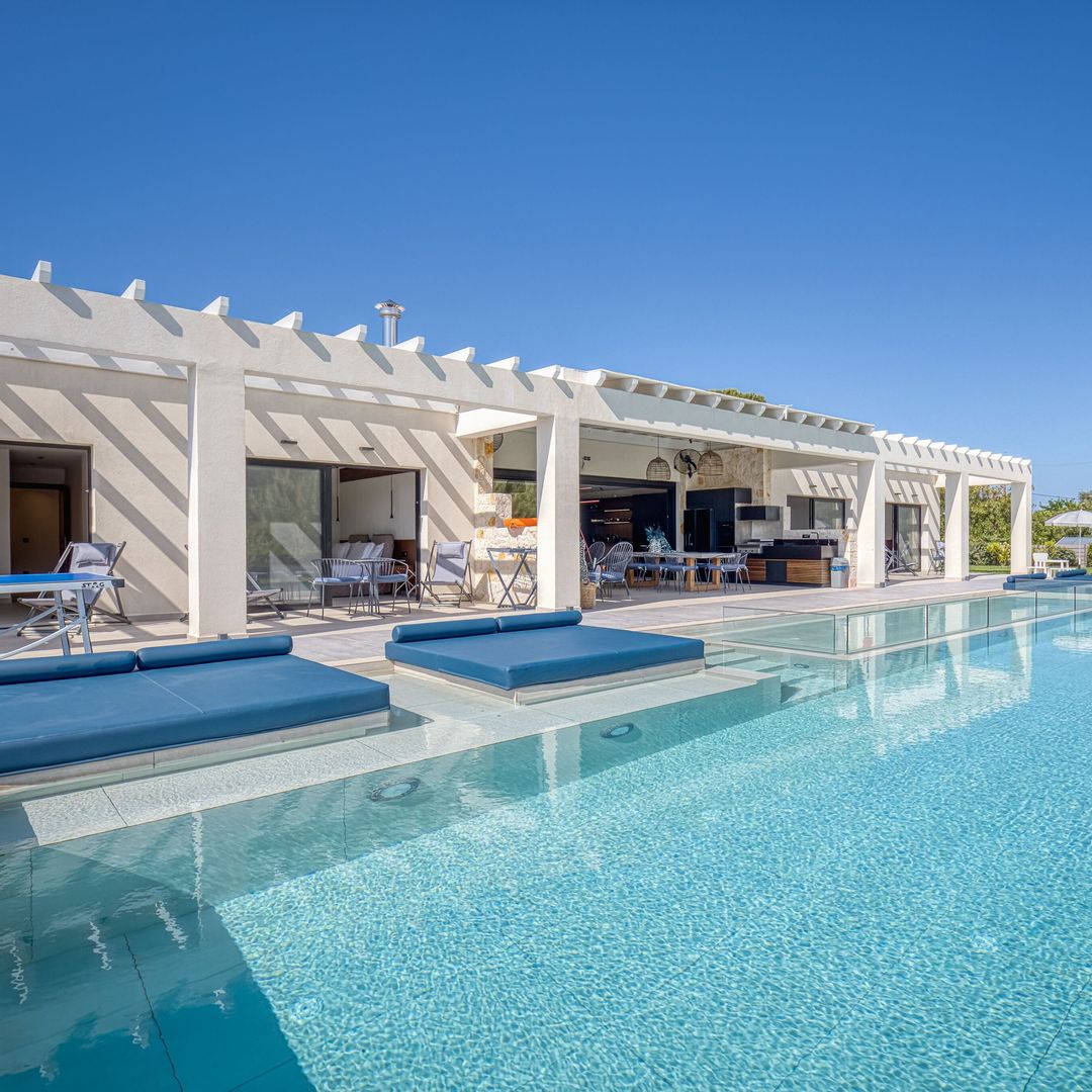 pool terrace at luxury villa abroad