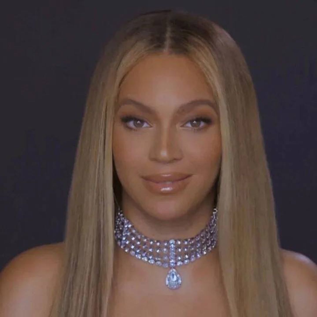 Beyoncé stuns in a sheer shimmery crop top and skirt - and fans are going wild