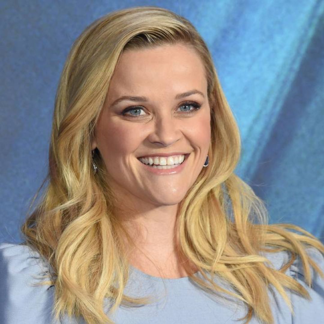 Reese Witherspoon's chic striped dress is giving us major summer vibes