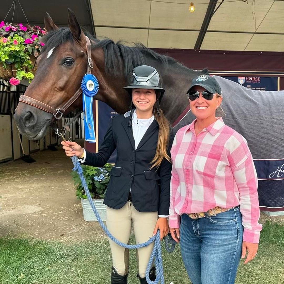 Grace Wahlberg poses with her horse after winning a blue ribbon, shared on Instagram