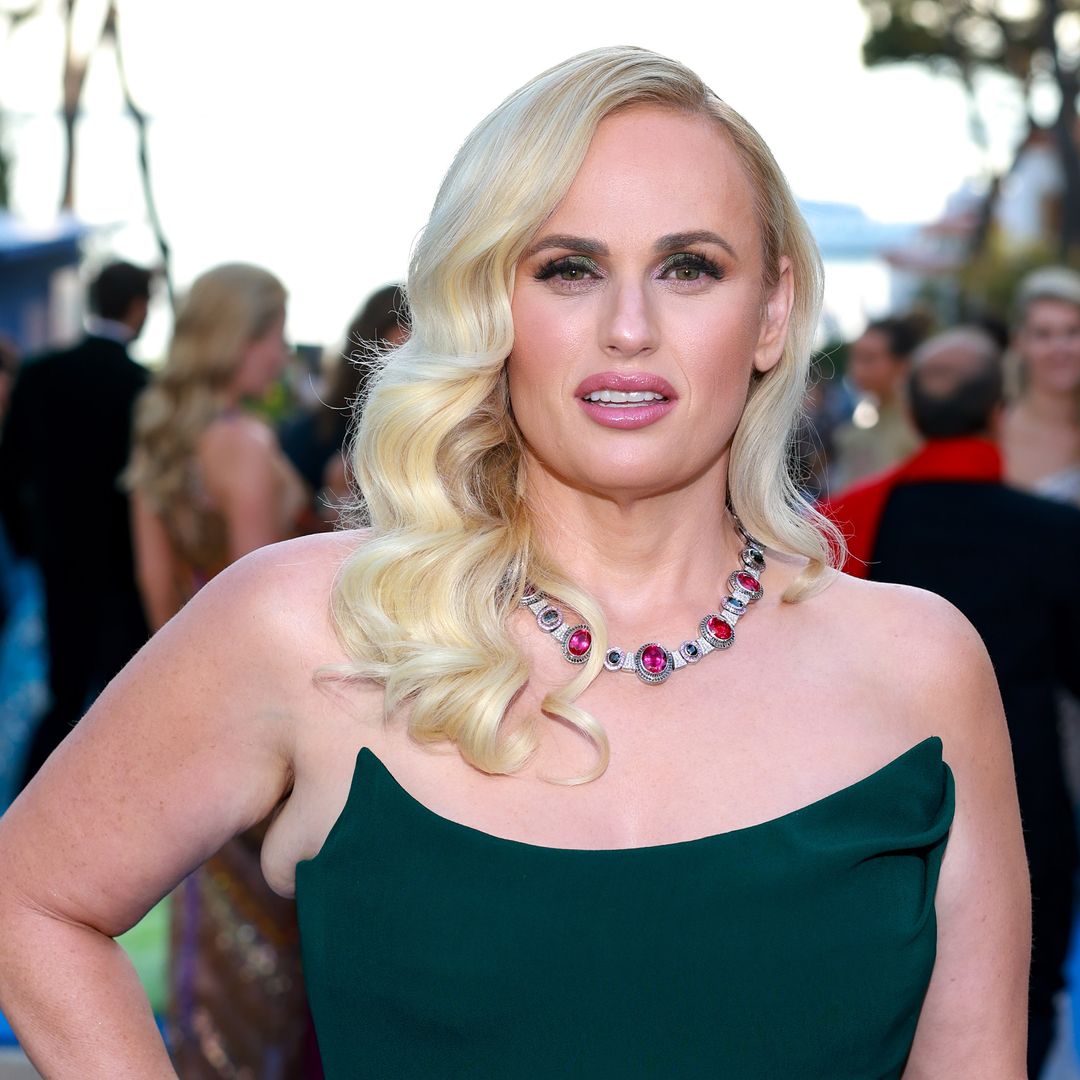 Rebel Wilson dons the most glamorous red gown in new photo with baby daughter Royce