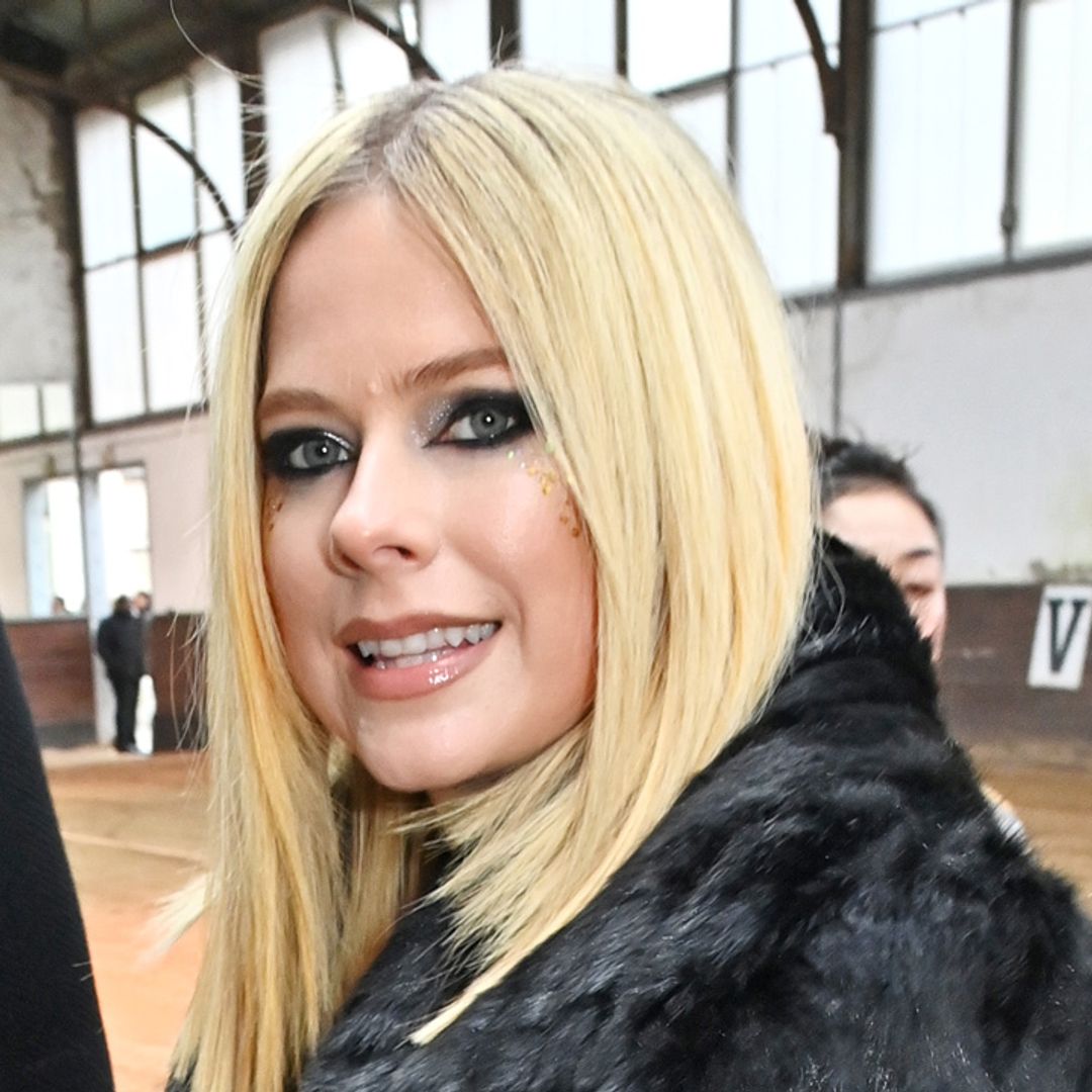 Newly single Avril Lavigne puts on show-stopping display in knee-high boots