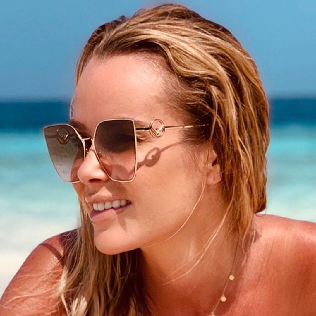 Amanda Holden oozes glamour as she plays in the sea on idyllic Maldives holiday