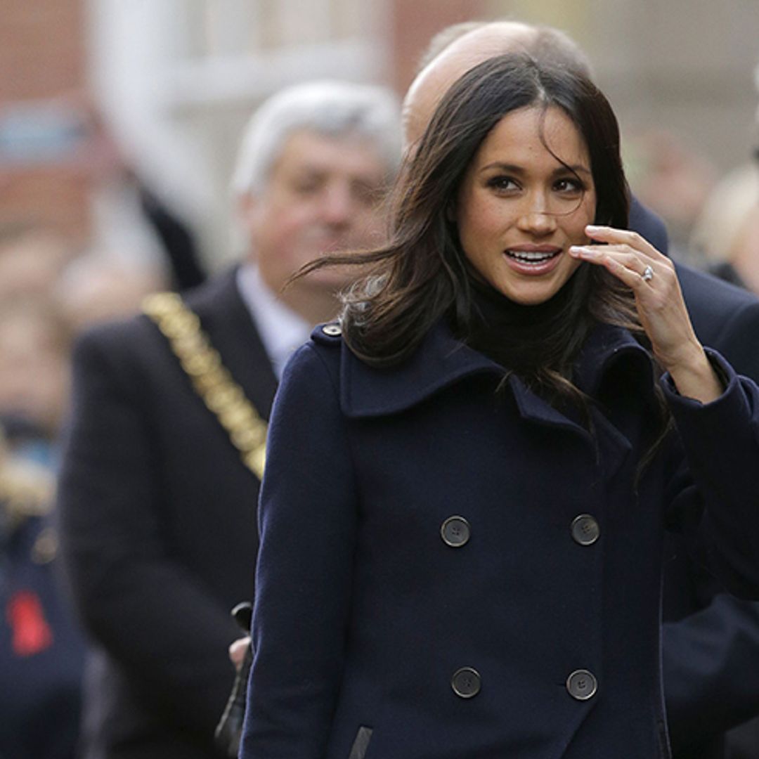 Meghan Markle stuns in Mackage navy coat on very first royal engagement