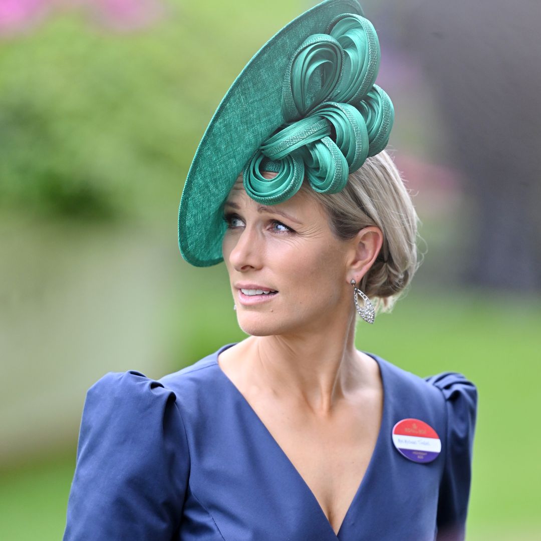 Zara Tindall surprises in plunging satin gown and daring emerald hat