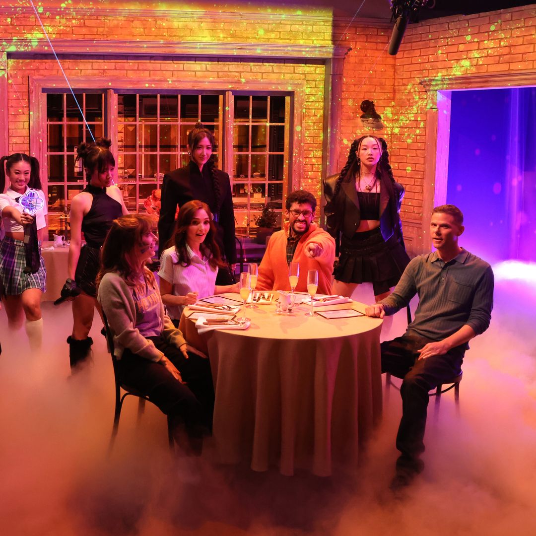 SATURDAY NIGHT LIVE -- Episode 1885 -- Pictured: (standing l-r) Bowen Yang, Rei Ami, Ejae, Audrey Nuna; (seated l-r) Sarah Sherman, Chloe Fineman, host Bad Bunny, and Mikey Day during the "K-Pop Demon Hunters" sketch on Saturday, October 4, 2025