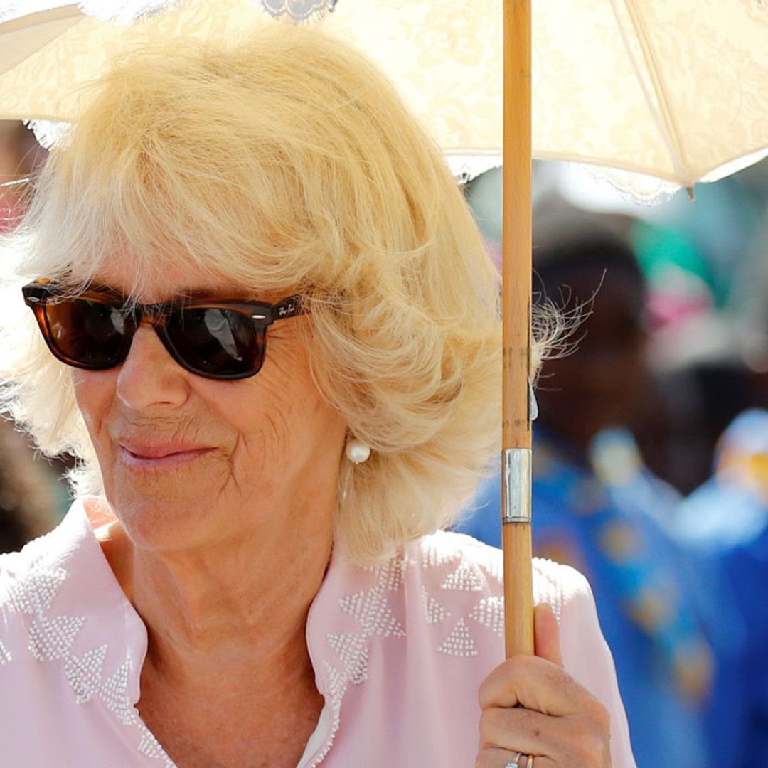 The Duchess of Cornwall looks cool in pink in St. Vincent with Prince Charles