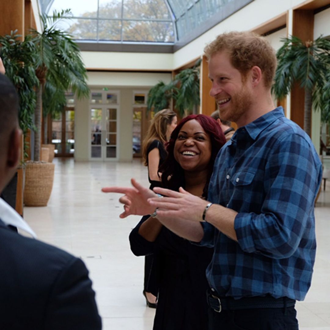 Prince Harry shows his charitable side as he supports HIV/AIDS sufferers