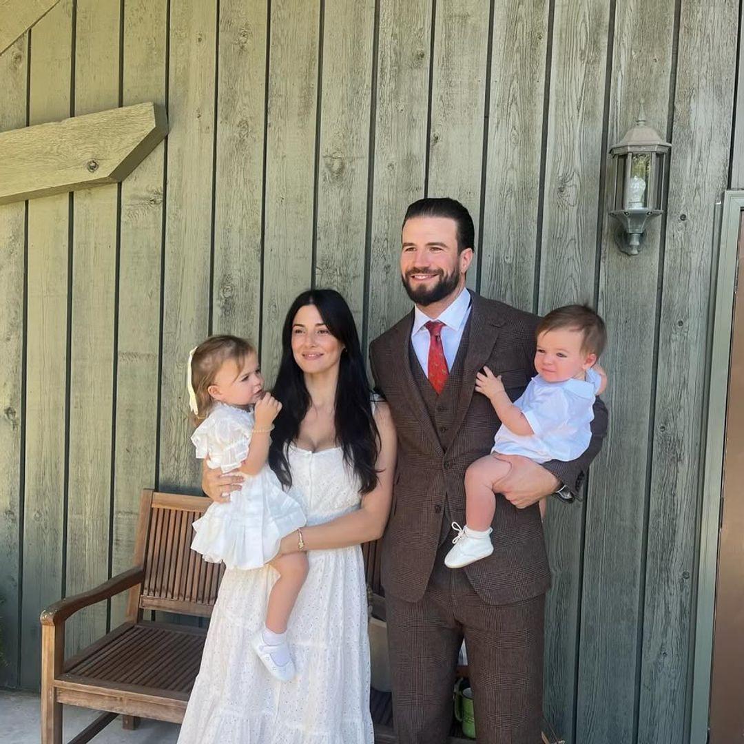 Sam Hunt and Hannah Lee Fowler with their children Lucy and Lowry pose for a photo outside their home ahead of church, shared on Instagram