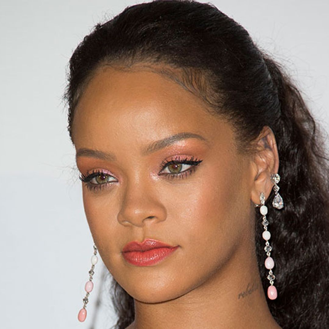 Rihanna nails yet another Valerian red carpet look in pink Prada outfit
