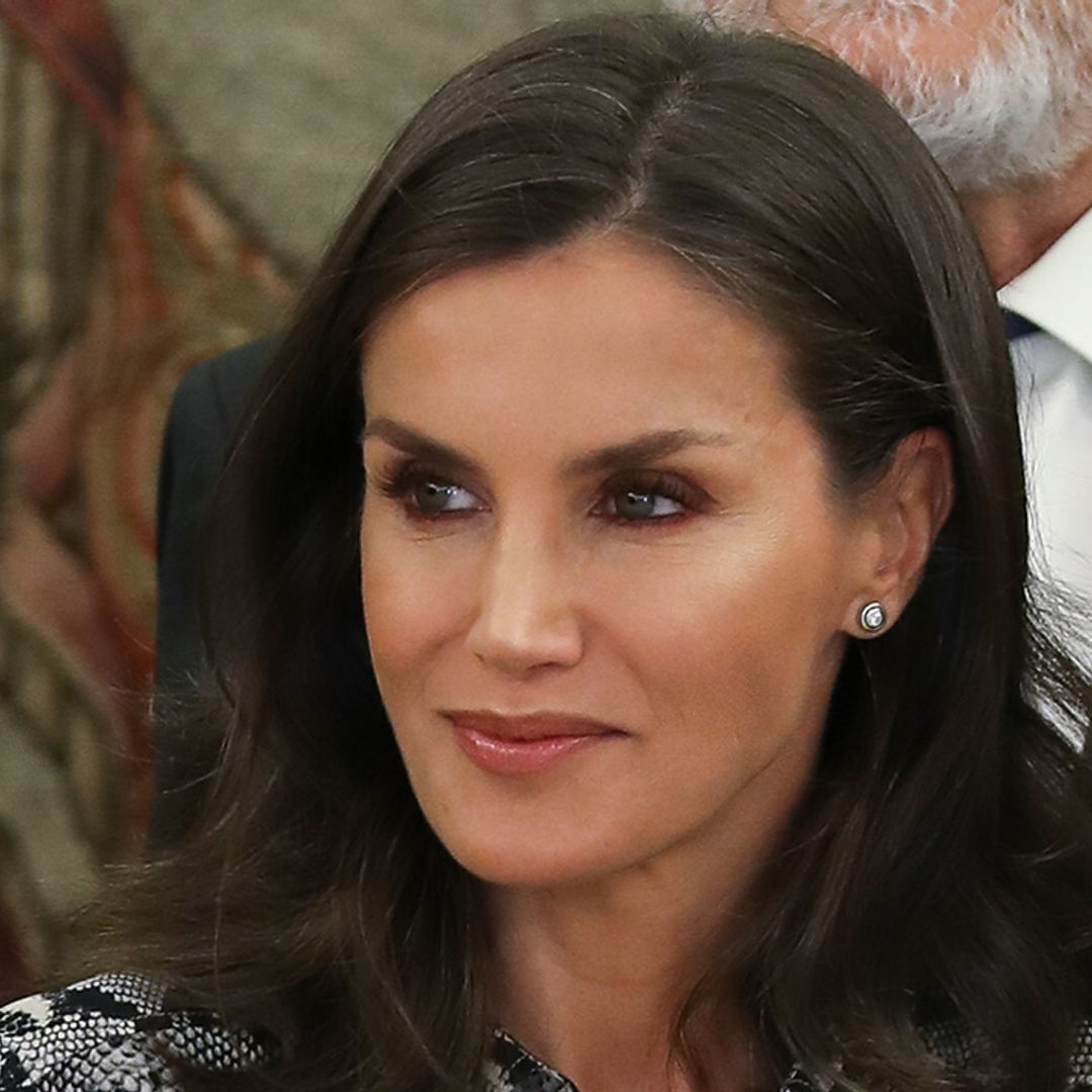 Queen Letizia just wore a dreamy orange blouse with animal print in Madrid