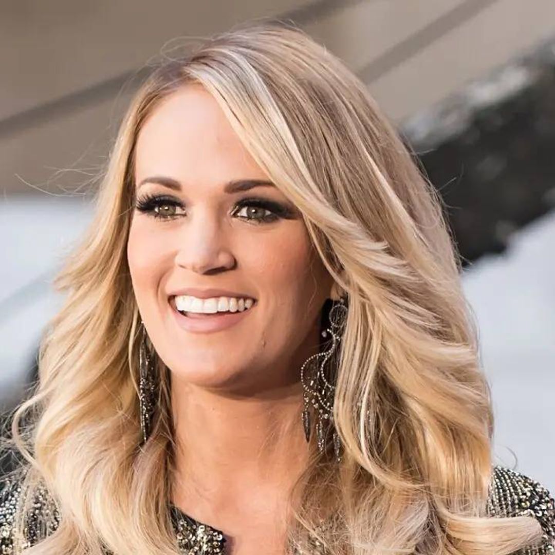 Carrie Underwood resembles a Greek goddess with her beautiful gown and flowing hair