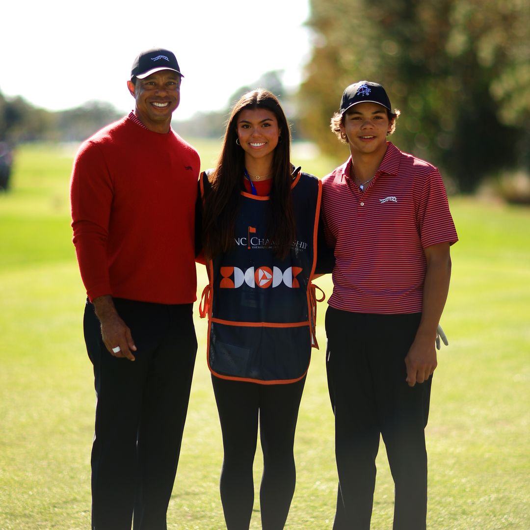 Tiger Woods of the United States with his son Charlie Woods and daughter Sam Woods stand on the first tee during the second round of the PNC Championship at Ritz-Carlton Golf Club on December 22, 2024 in Orlando, Florida