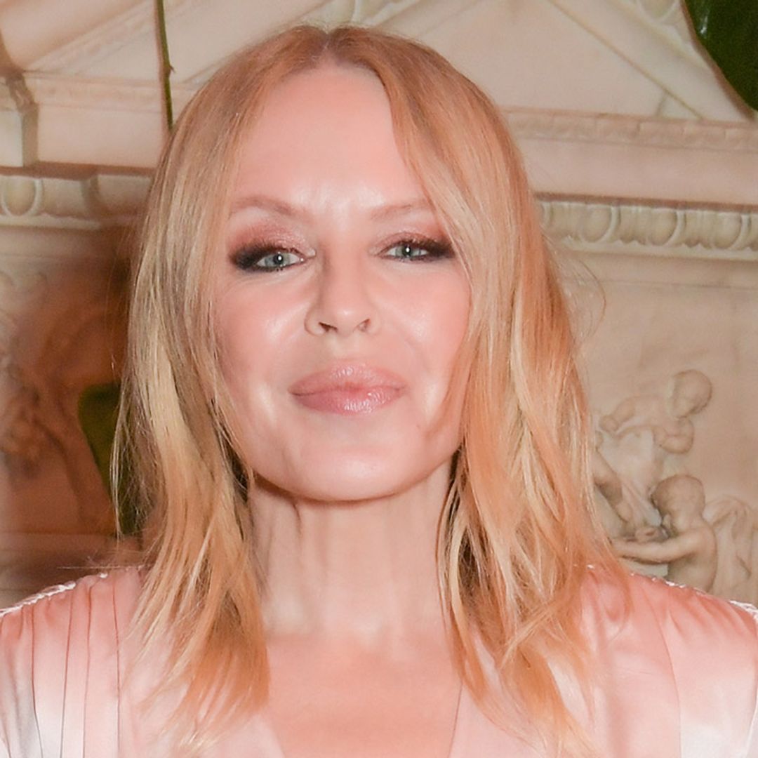 Kylie Minogue dazzles fans in striking pink ensemble
