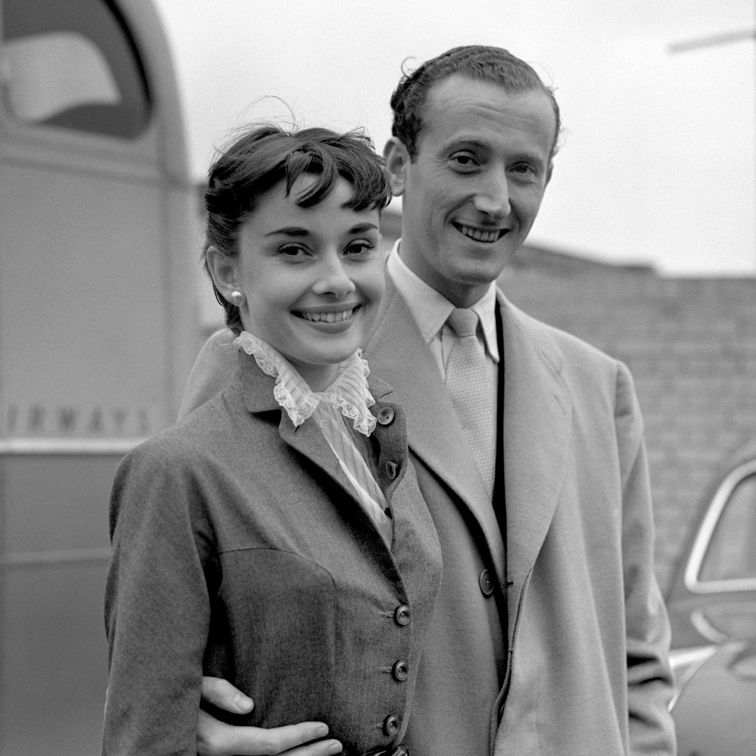 Reunited at Northolt Airport were film star Audrey Hepburn and her fiance James Hanson who she was to have married today but the wedding was postponed due to filming delays.