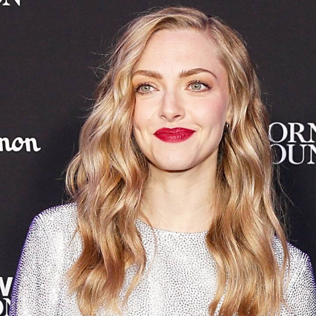 Amanda Seyfried dazzles in lacy red dress as she promotes her hit series The Drop Out
