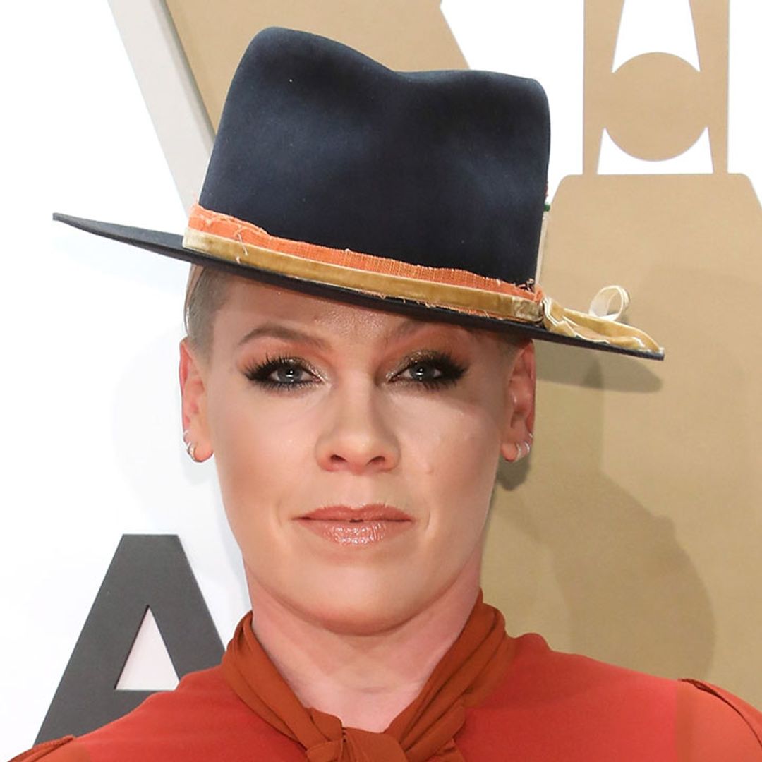 Pink shocks fans with 'leg contraption' after 'brutal' health crisis - watch