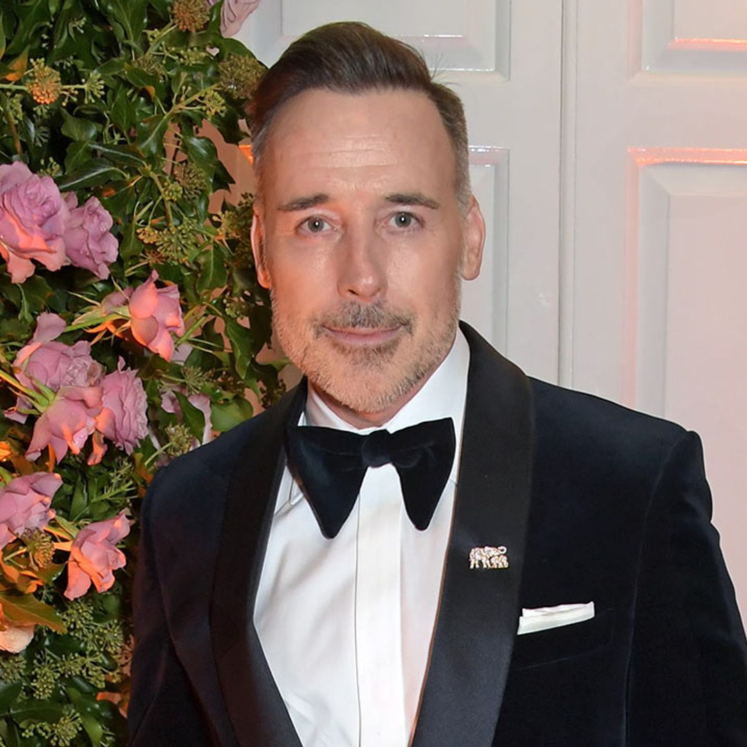 David Furnish poses with sons Elijah and Zachary in epic Halloween costumes