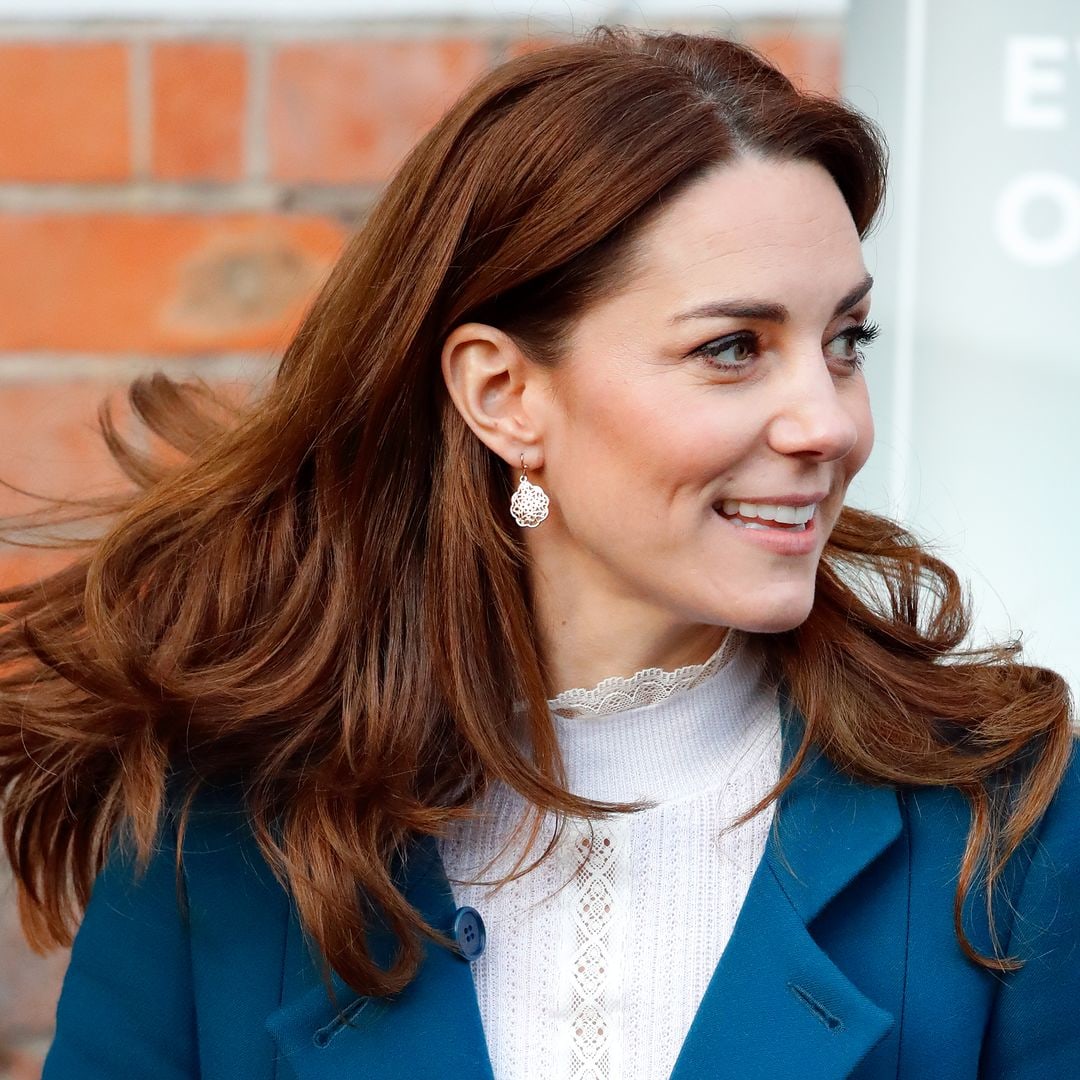 Princess Kate rocks flippy mini dress to dance with Prince Louis' godfather in unearthed photos
