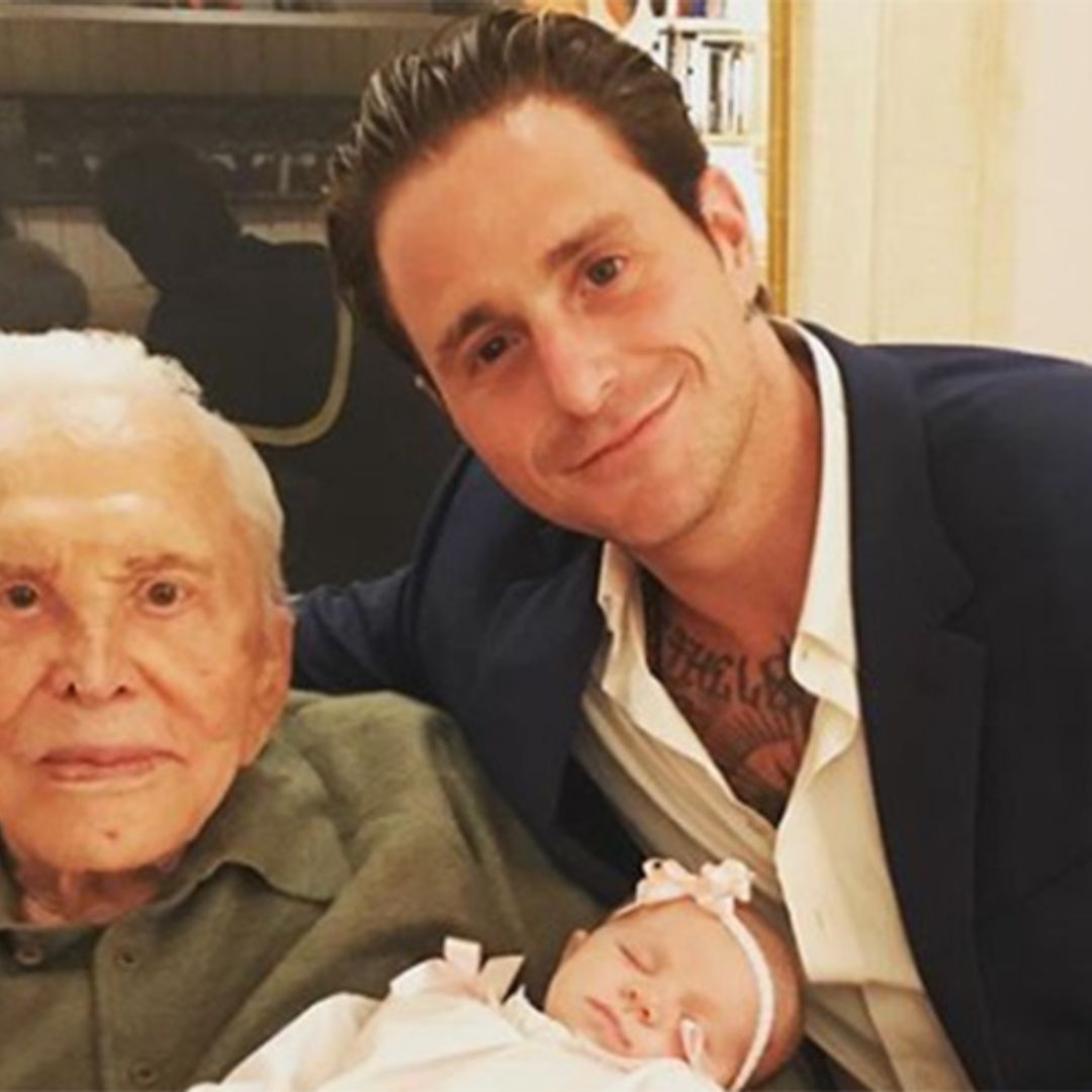 Kirk Douglas, 101, cradles great-grandchild in adorable photo