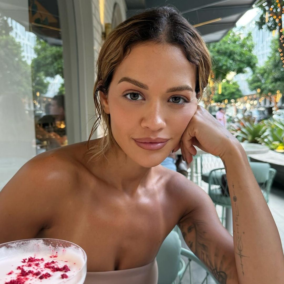 Rita Ora just styled her tiny string bikini with the weirdest shoes