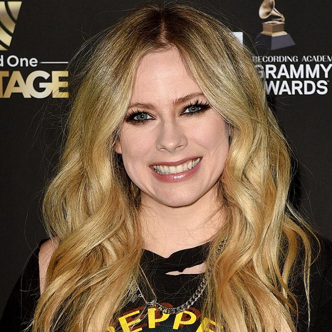 Avril Lavigne stuns in daring neon-green outfit