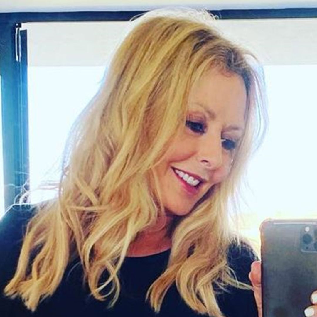 Carol Vorderman shows off incredible physique in cinched leather shirt