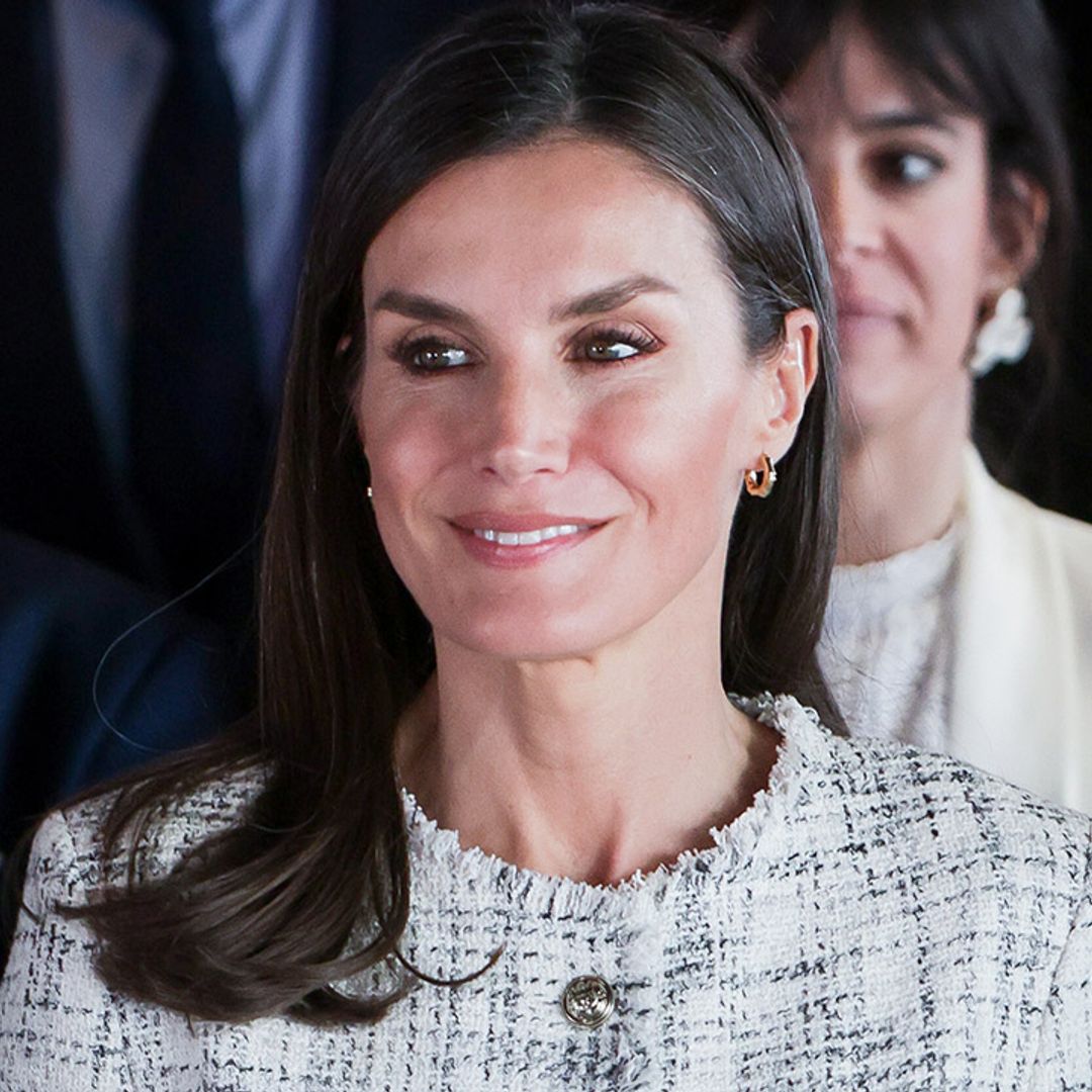 Queen Letizia ups the ante in sleek trousers and high street heels