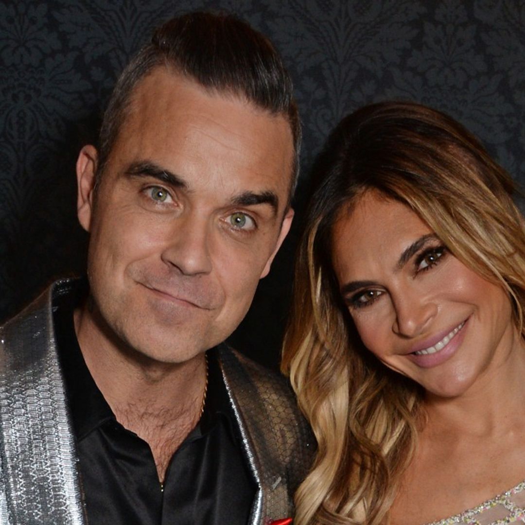 Robbie Williams' wife Ayda Field shares sweet photo of son Charlie helping with baby siblings