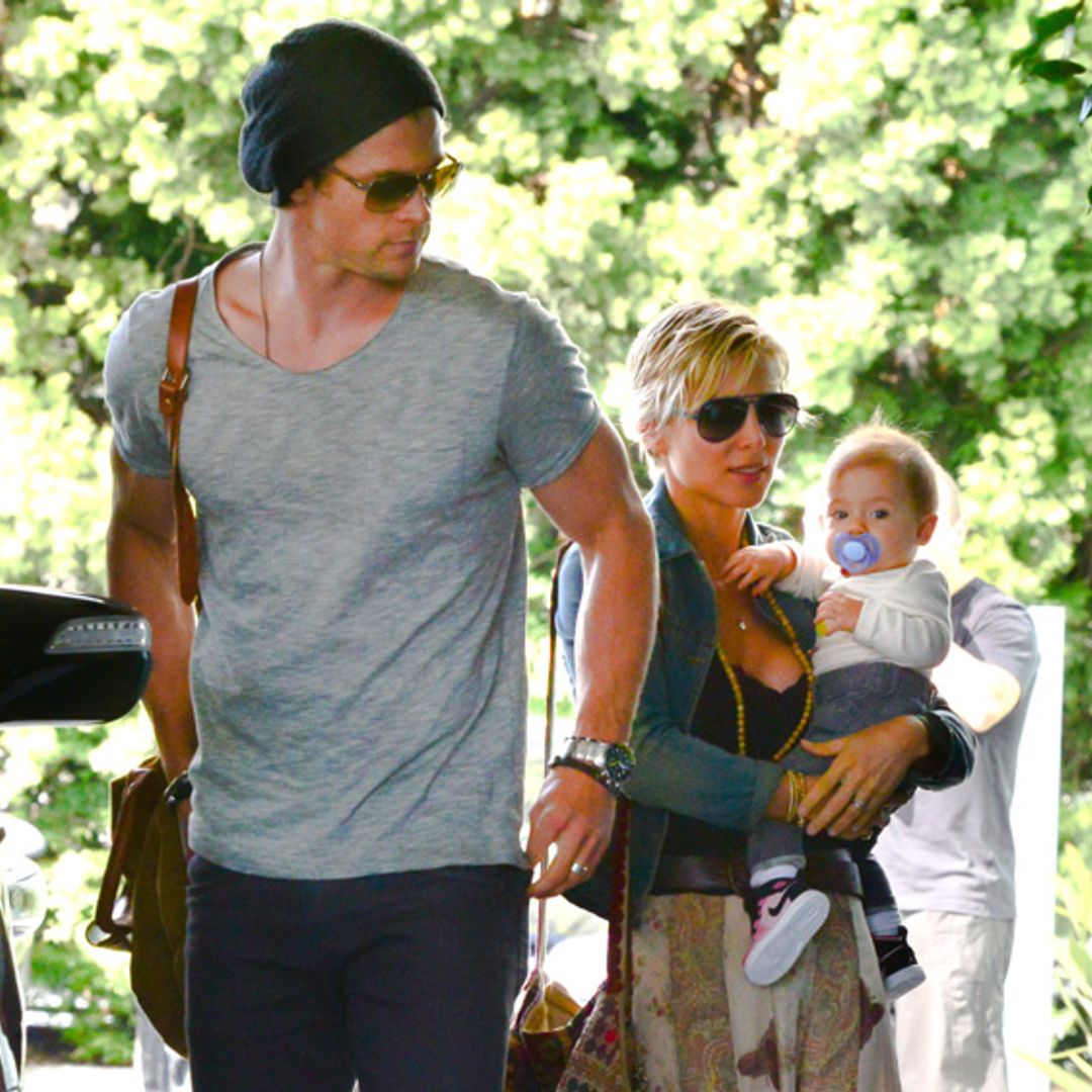 Chris Hemsworth keeps a protective eye on baby daughter India and wife Elsa