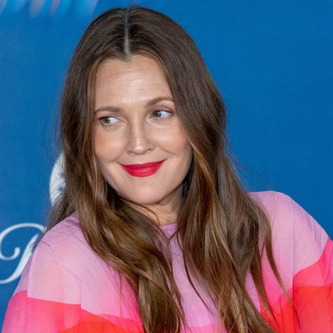 Drew Barrymore causes a stir as she shares cheeky moment with guest: 'There's something about you'