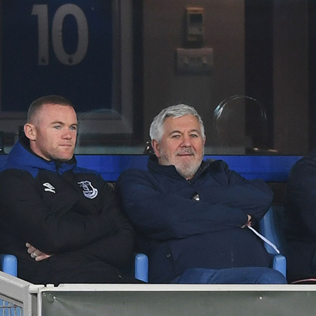 Wayne Rooney pictured watching football with his father-in-law and son Kai