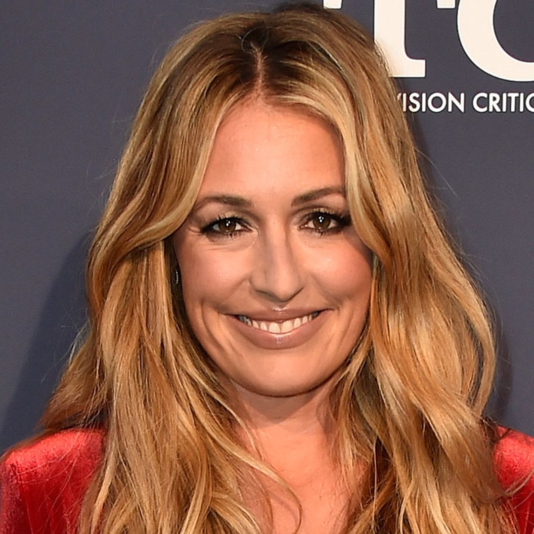Cat Deeley shows off toned midriff as she relaxes with son