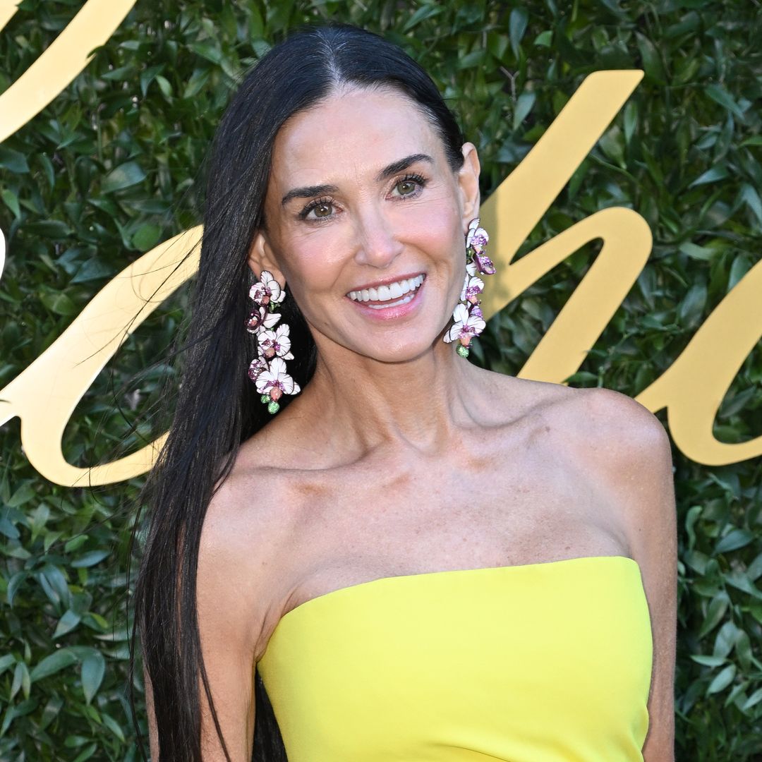Demi Moore, 61, is a ray of sunshine in unexpected slinky gown and Barbie heels
