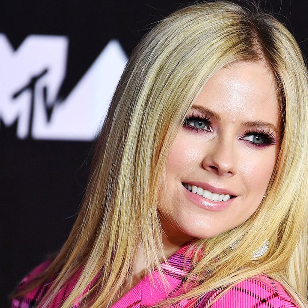 Avril Lavigne seriously turns up heat in tiny denim shorts and crop top